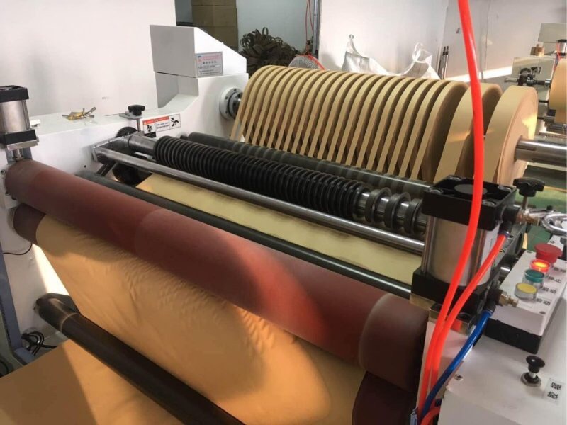 SLITTER REWINDER FOR TIPPING AND CIGARETTE PAPER